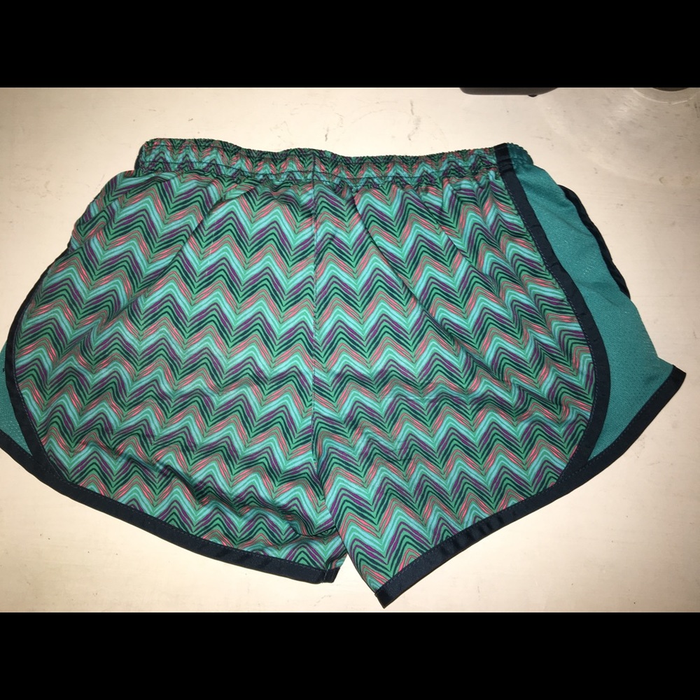 Medium in kids size, Nike running shorts
